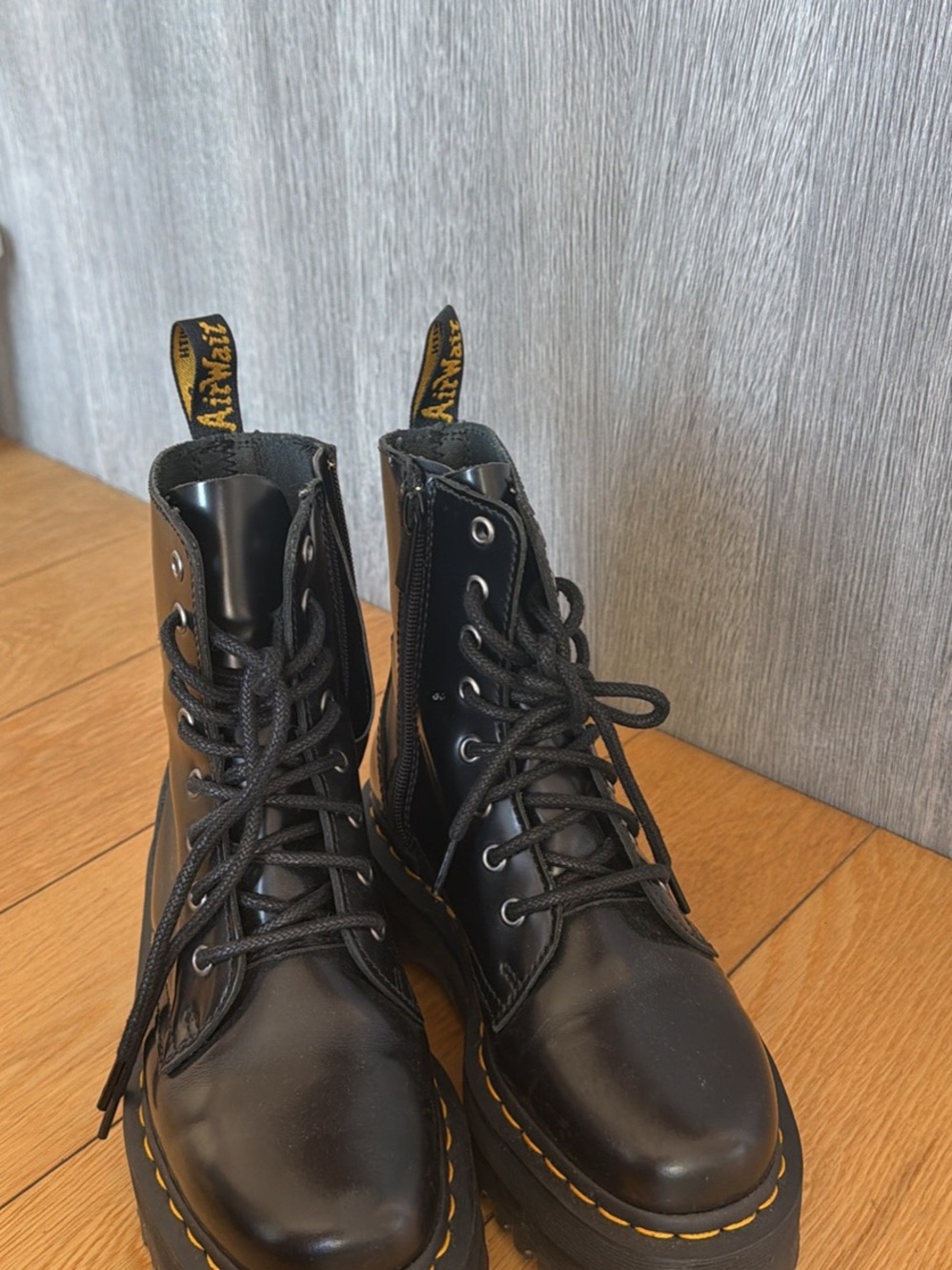 Dr. Martens Black Leather Combat Boots with Yellow Stitching